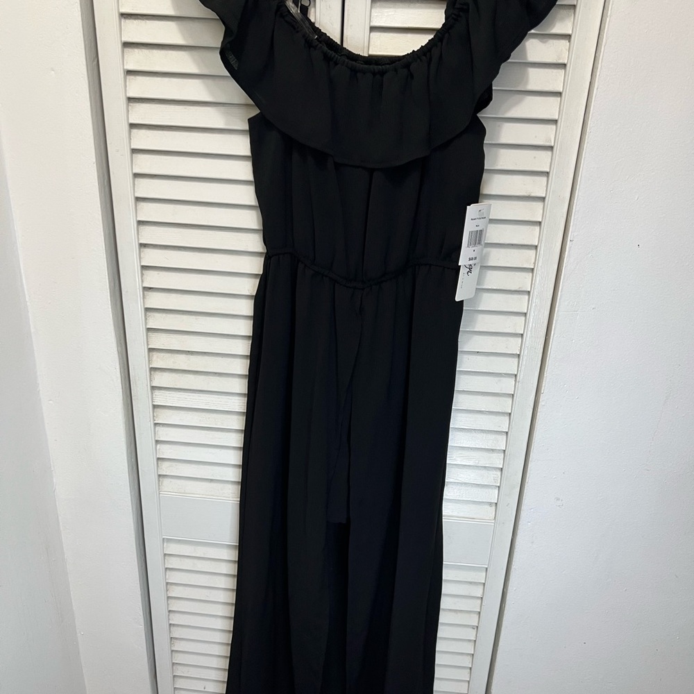 Black Romper Dress shorts under & skirt in the back  open in front. Best of both
